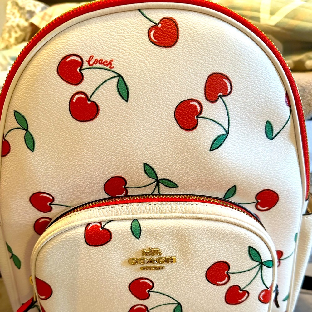 Coach Cherry backpack medium size, excellent condition, no scratches